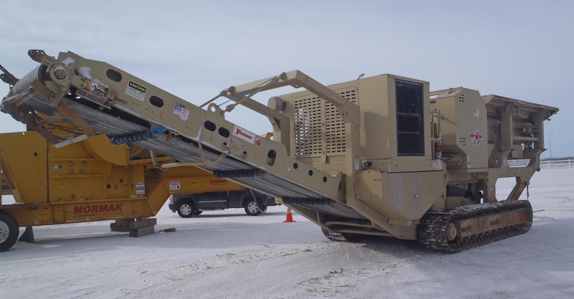 Rock crushers, loaders and rock trucks were some of the item Les sold at the Edmonton auction